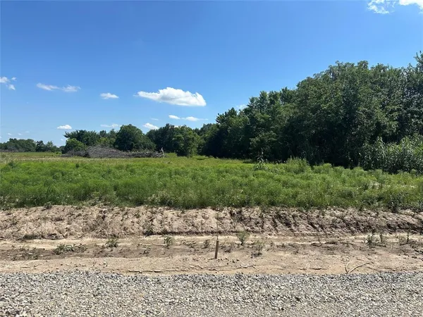 a view of a lake with a park