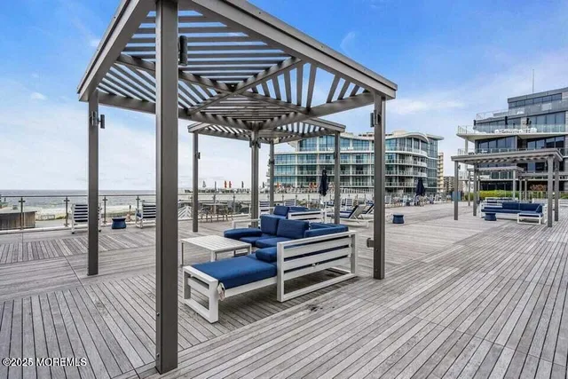 a view of a patio with a table and chairs