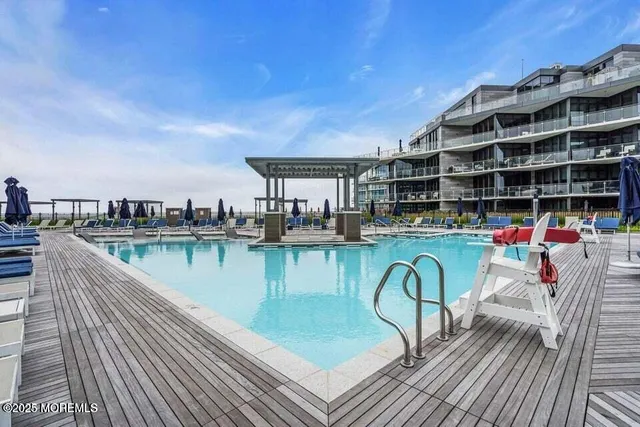 a living room with a flat screen tv and a couch