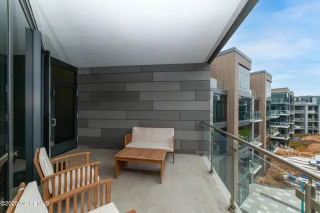 a view of a swimming pool with a lounge chairs