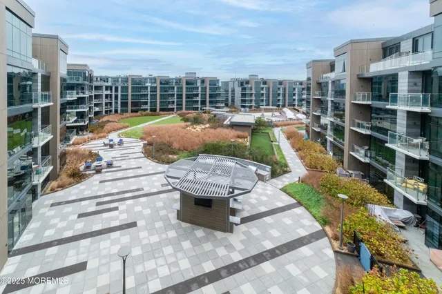 a kitchen with a sink cabinets and window