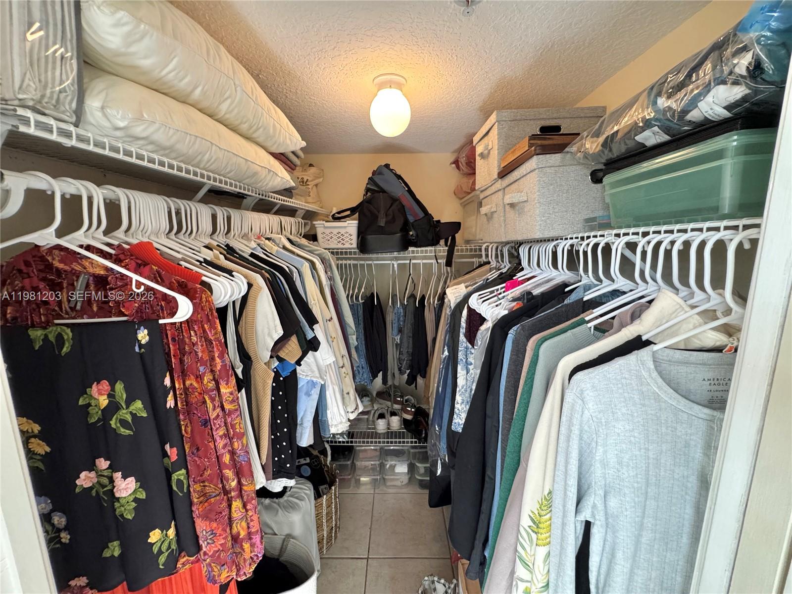 2630 Southwest 28th Street, Unit 1 Miami, FL 33133 - Photo 20 of 33 Large walk-in closet in Primary Bedroom. Additional closet space in main living area, too.