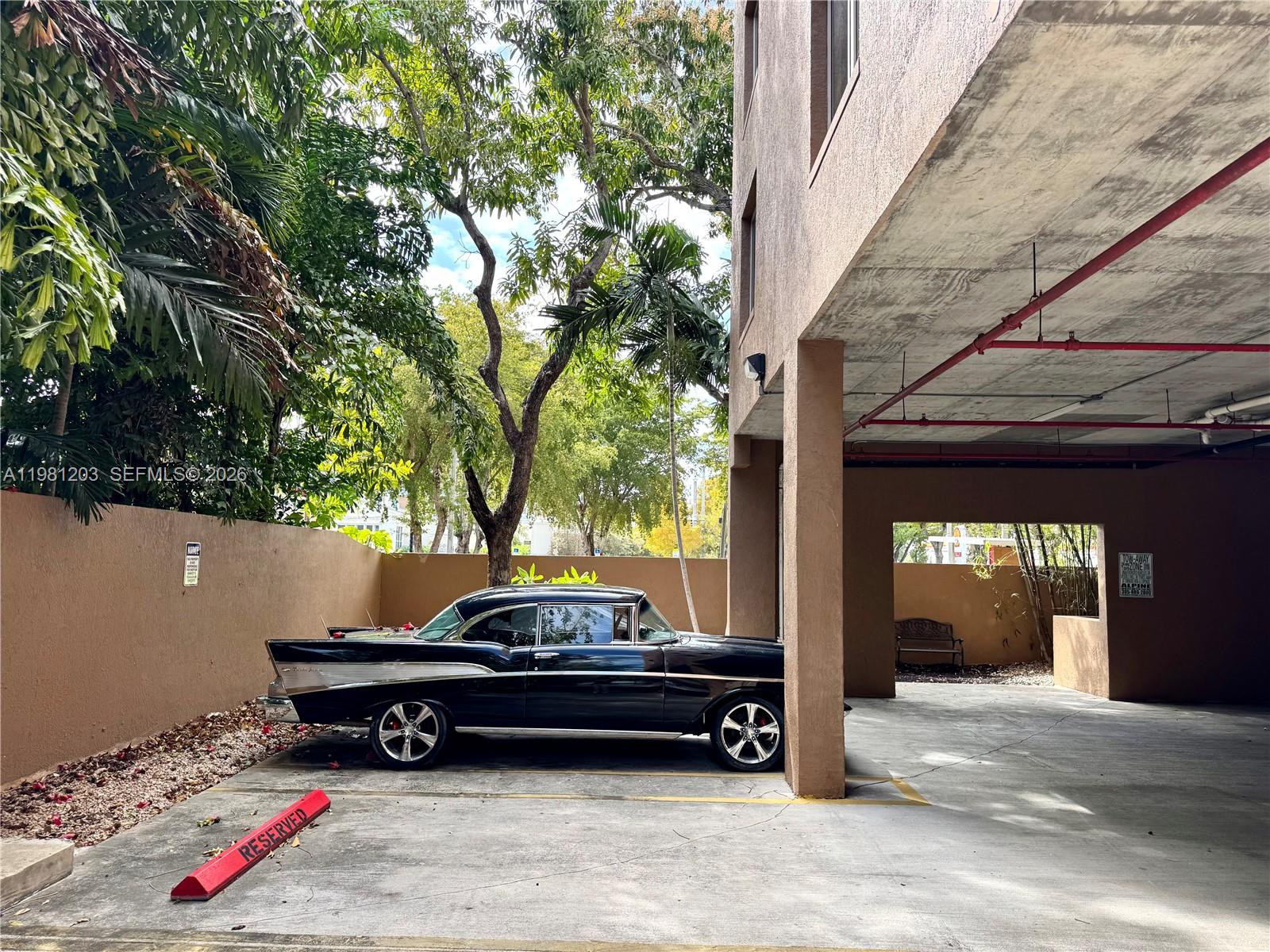 2630 Southwest 28th Street, Unit 1 Miami, FL 33133 - Photo 24 of 33 Outside and secure guest parking available plus 1 assigned covered garage space included.