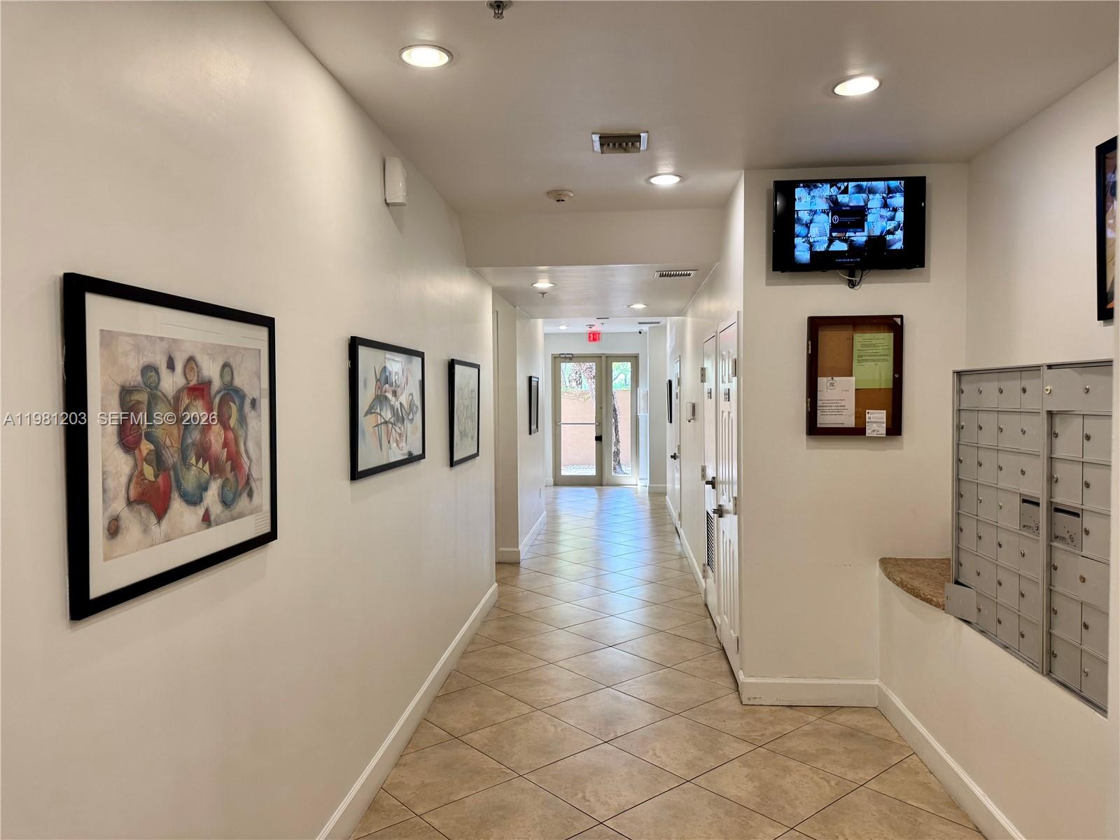 2630 Southwest 28th Street, Unit 1 Miami, FL 33133 - Photo 27 of 33 Secured mail room with CCTV for package deliveries.