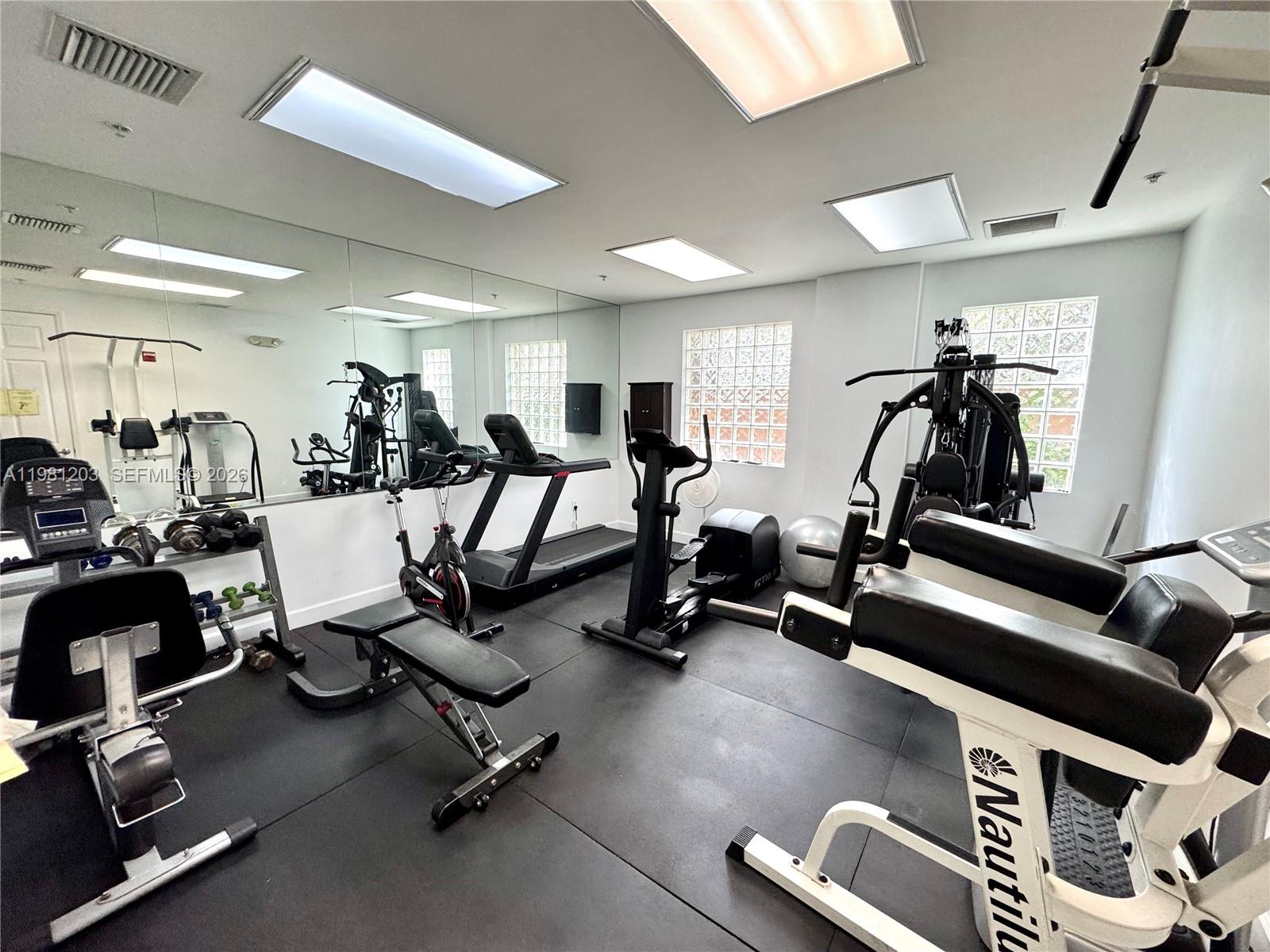 2630 Southwest 28th Street, Unit 1 Miami, FL 33133 - Photo 28 of 33 Fitness room on-site in Lobby along with the convenience of restrooms on same ground floor.