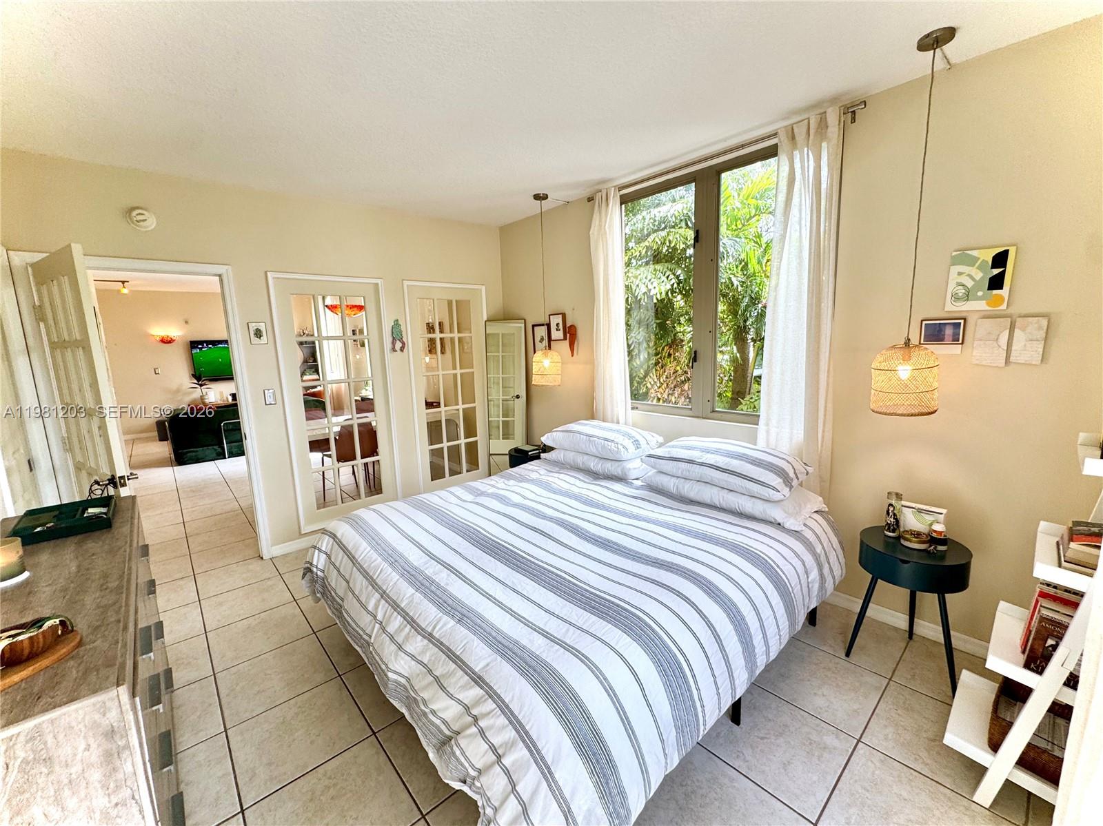 2630 Southwest 28th Street, Unit 1 Miami, FL 33133 - Photo 6 of 33 Corner location with gorgeous westerly light in the evenings means sleeping in on weekends is easy and stress-free.