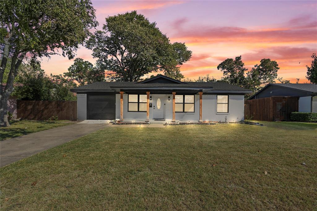 513 East Tyler Street Richardson, TX 75081 - Photo 1 of 18 a front view of a house with a garden