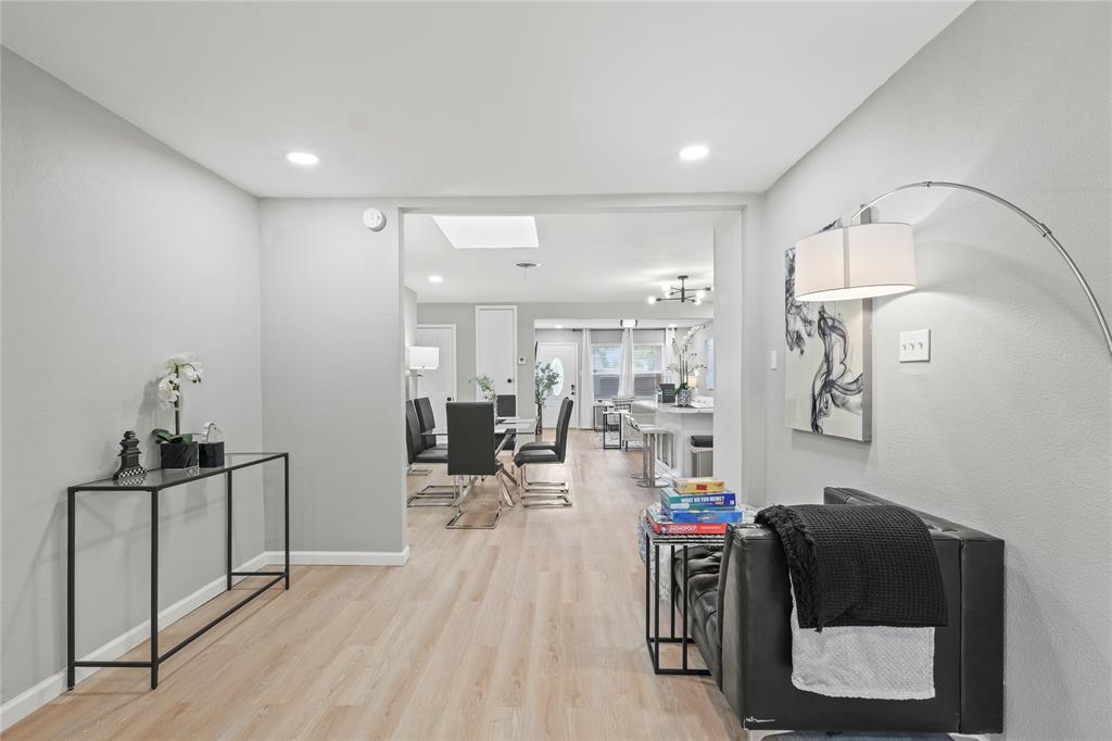 513 East Tyler Street Richardson, TX 75081 - Photo 11 of 18 a living room with furniture and wooden floor