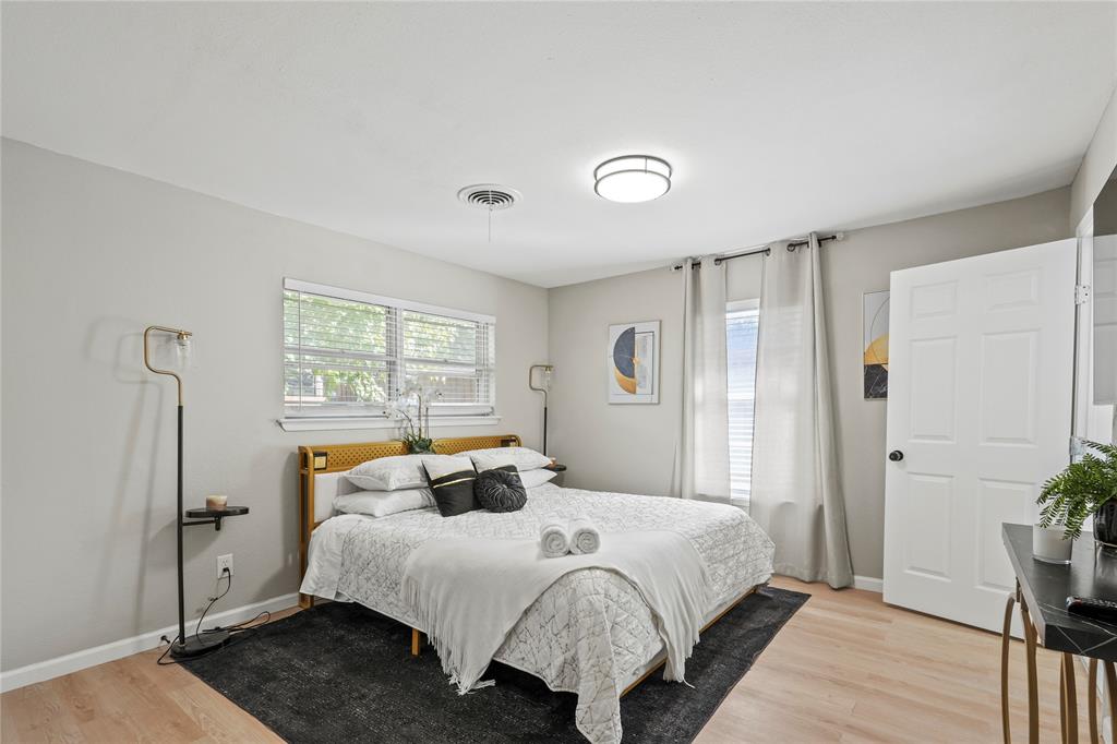 513 East Tyler Street Richardson, TX 75081 - Photo 12 of 18 a bedroom with a bed and a window