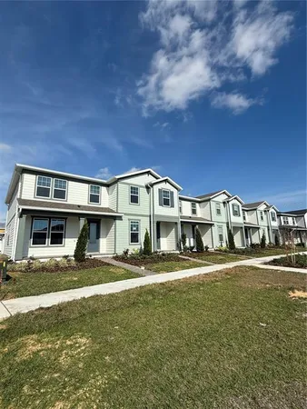 a front view of a building with garden
