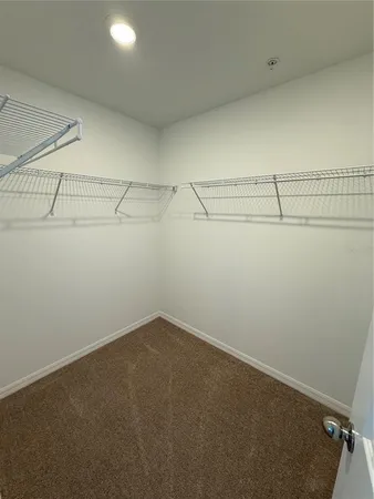 a view of a room with racks on the wall