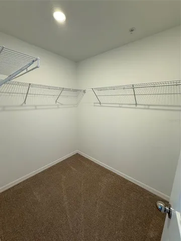 a view of a room with racks on the wall