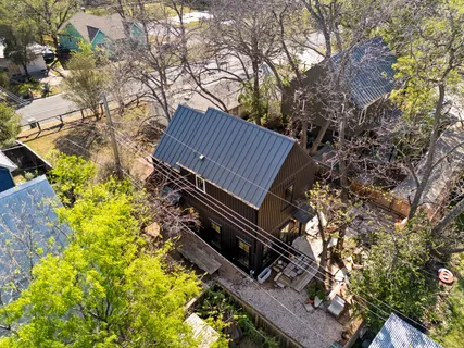 a view of a back yard of the house