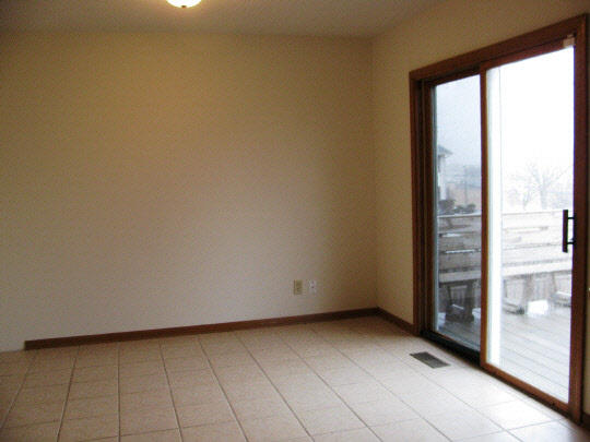 5376 Rockingham Drive Loves Park, IL 61111 - Photo 5 of 11 a view of an empty room with a window