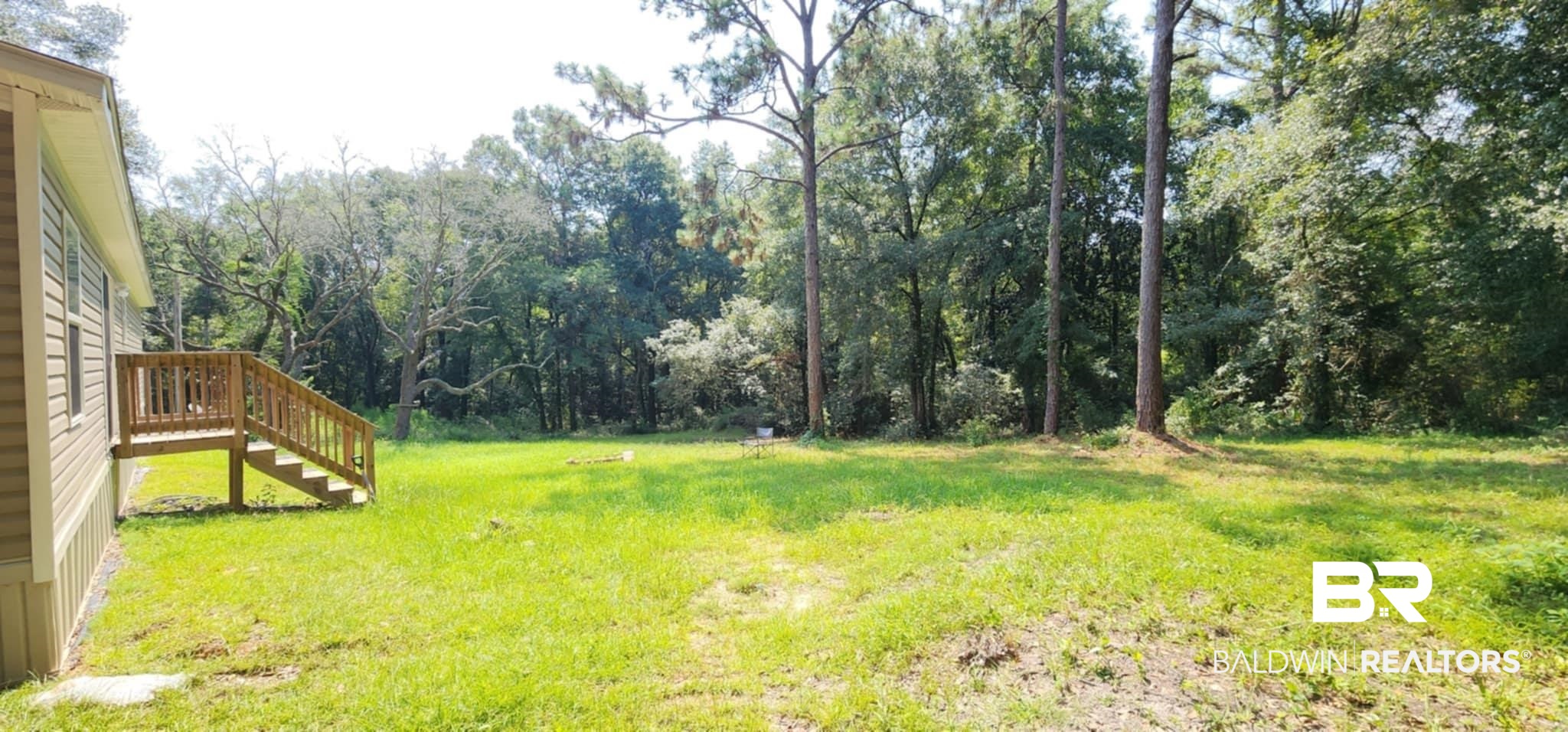 25474 Waterworld Road Robertsdale, AL 36567 - Photo 30 of 30 View of grassy yard with stairs