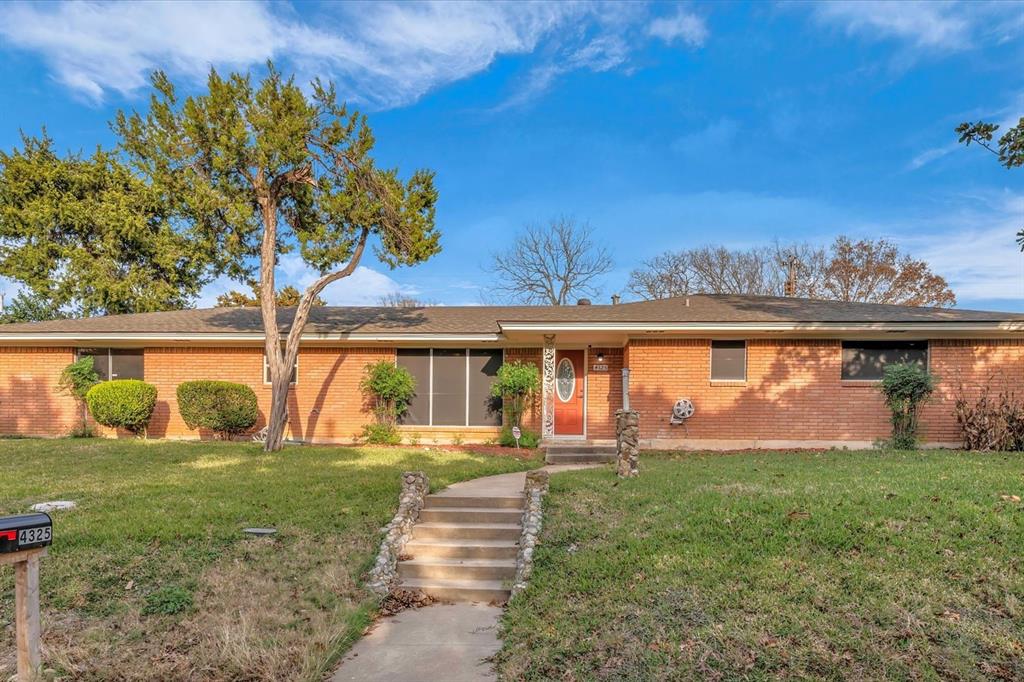 4325 Shady Glen Drive Waco, TX 76708 - Photo 1 of 40 a front view of a house with garden