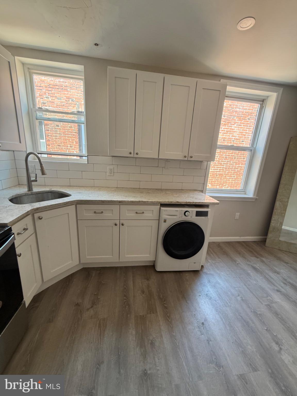 2013 North 63rd Street Philadelphia, PA 19151 - Photo 11 of 13 a kitchen with a sink and a stove