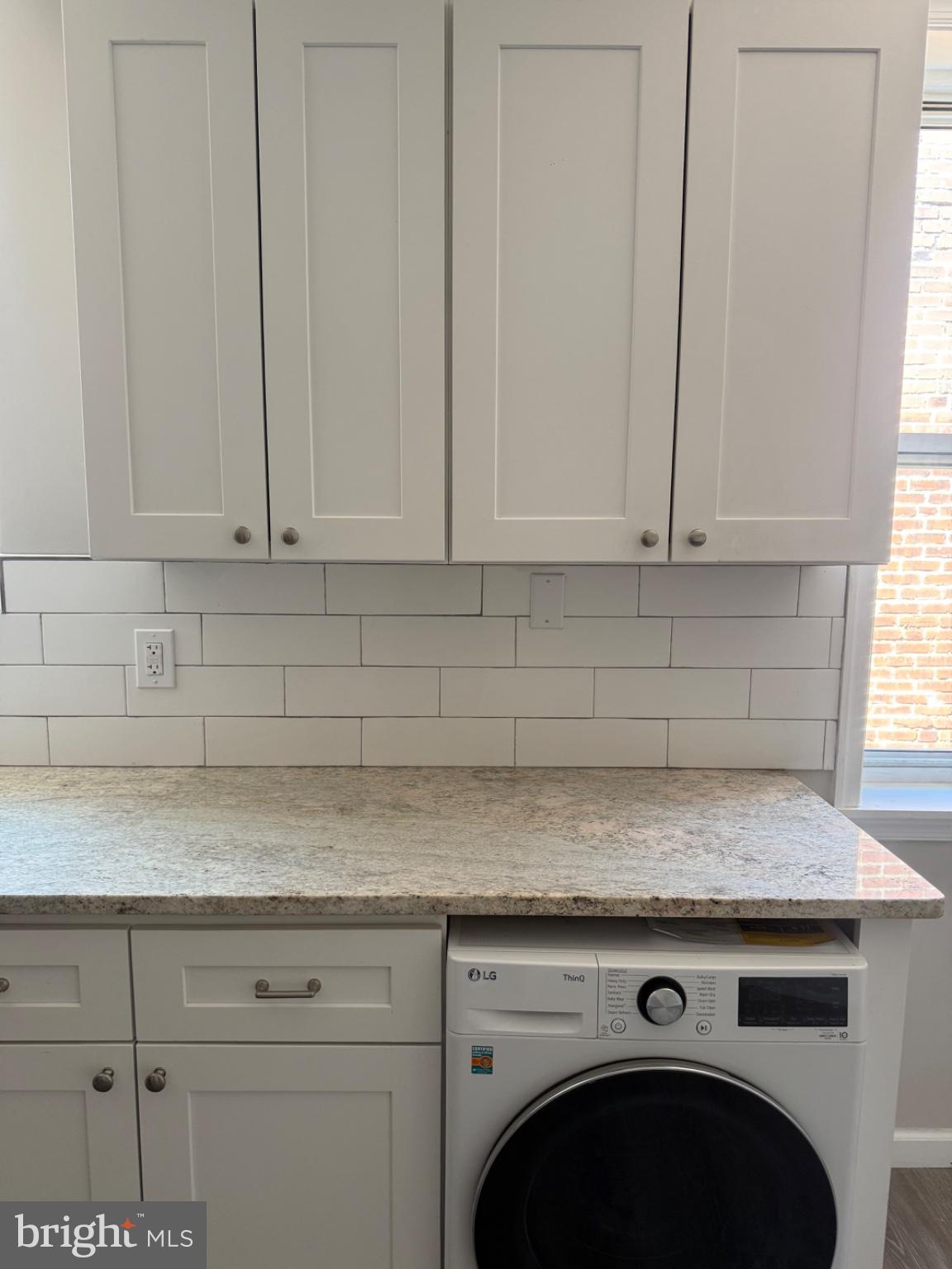 2013 North 63rd Street Philadelphia, PA 19151 - Photo 12 of 13 a view of a kitchen with granite countertop white cabinets