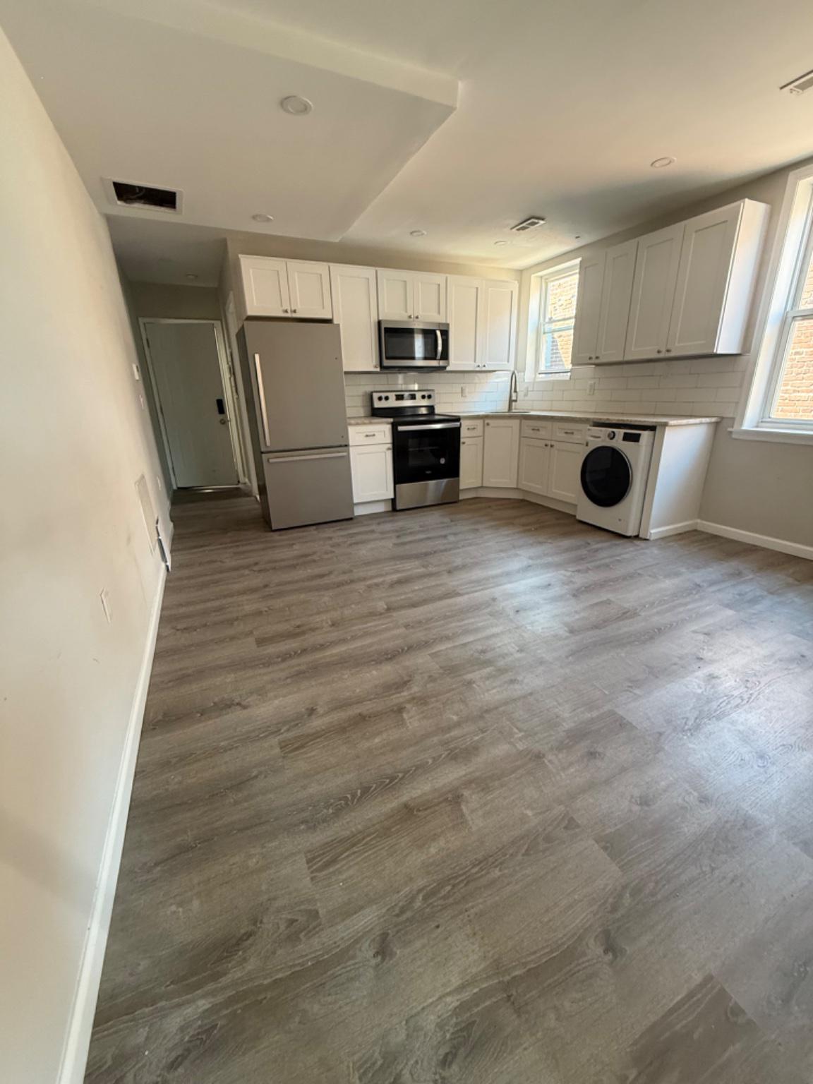 2013 North 63rd Street Philadelphia, PA 19151 - Photo 2 of 13 a view of kitchen and microwave
