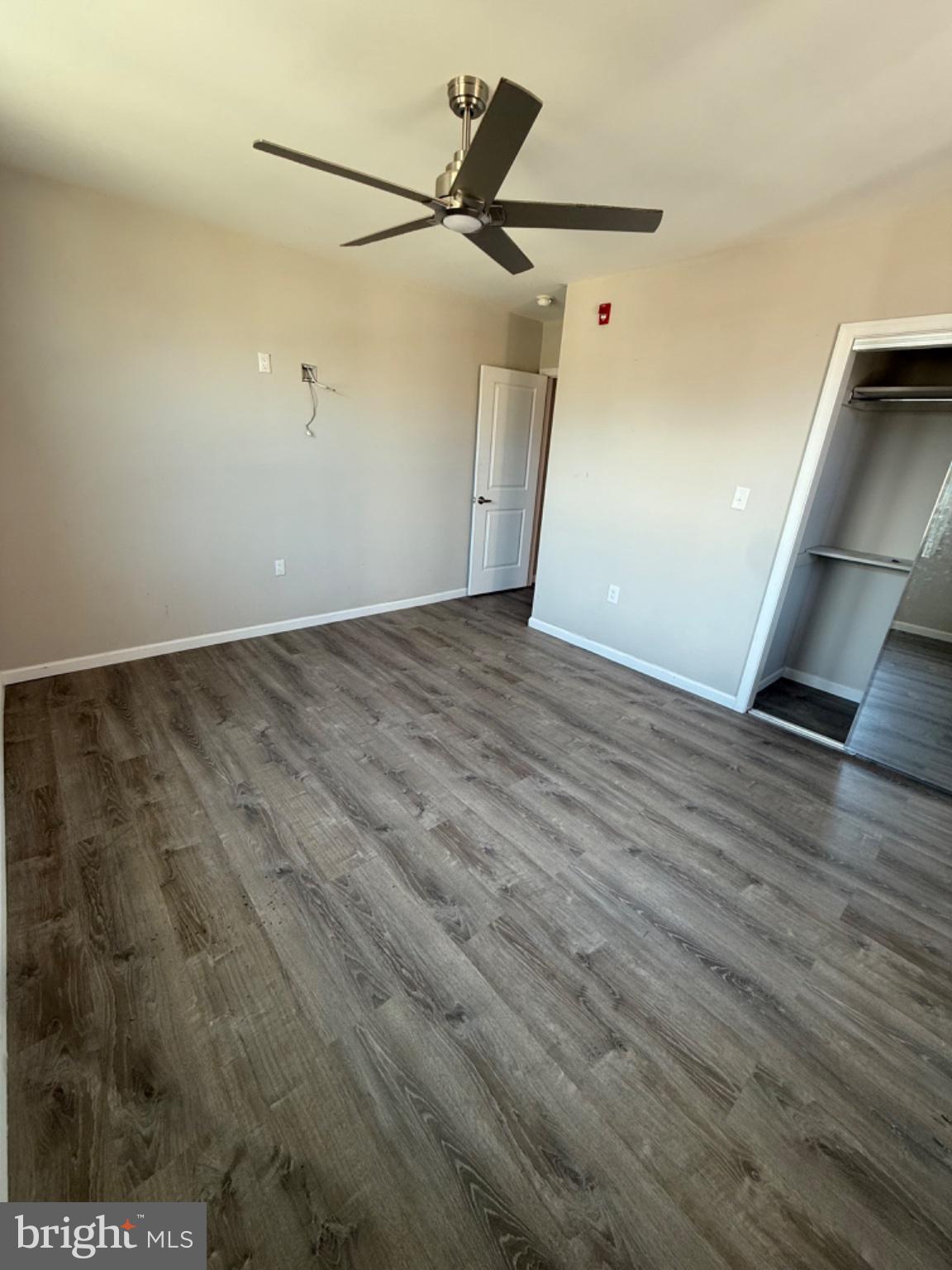 2013 North 63rd Street Philadelphia, PA 19151 - Photo 8 of 13 a view of a livingroom with wooden floor and a ceiling fan