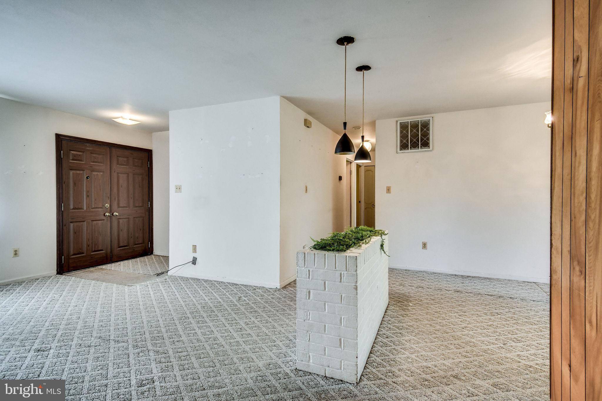 701 West Nettle Tree Road Sterling, VA 20164 - Photo 5 of 32 Open living and dining room