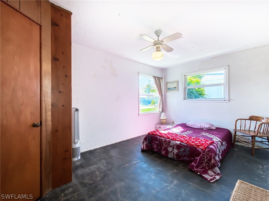 1573 Ransom Street Fort Myers, FL 33901 - Photo 18 of 29 a bedroom with a bed and a window