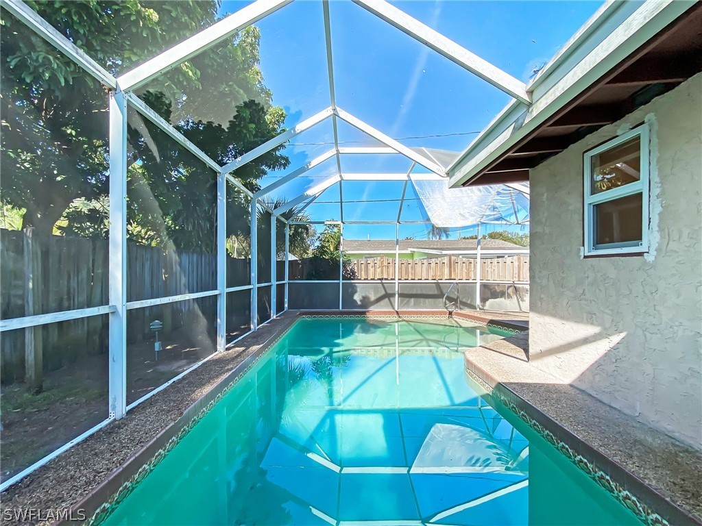 1573 Ransom Street Fort Myers, FL 33901 - Photo 26 of 29 a view of a backyard with table and chairs