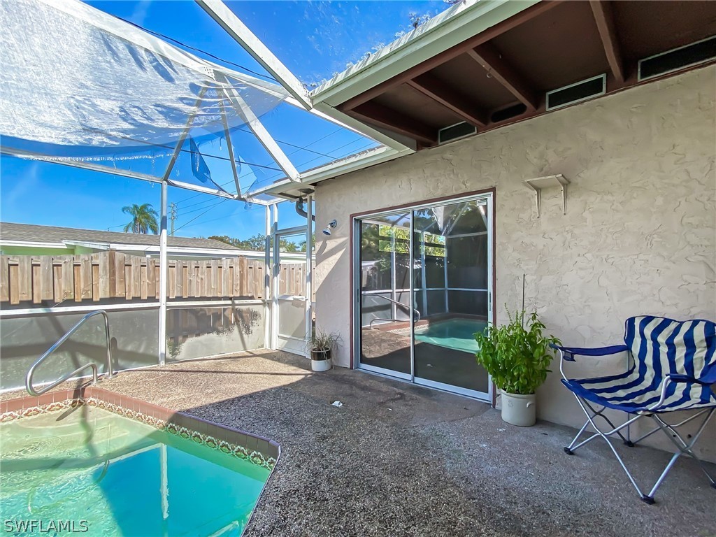 1573 Ransom Street Fort Myers, FL 33901 - Photo 27 of 29 a view of a backyard with table and chairs