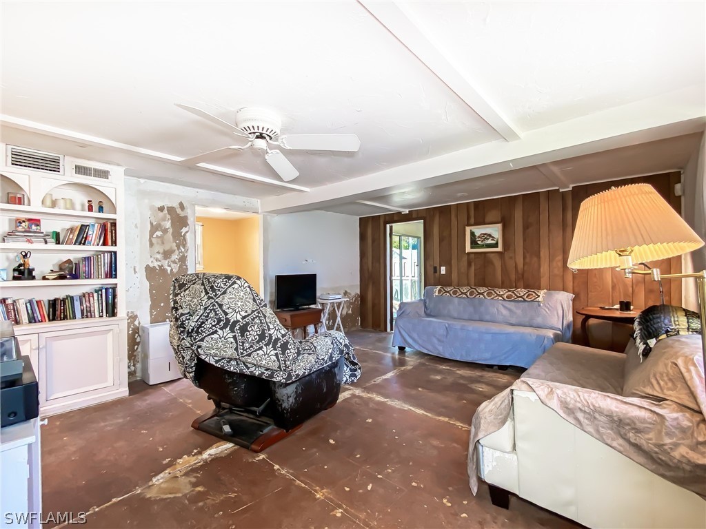 1573 Ransom Street Fort Myers, FL 33901 - Photo 6 of 29 a living room with furniture and a fireplace