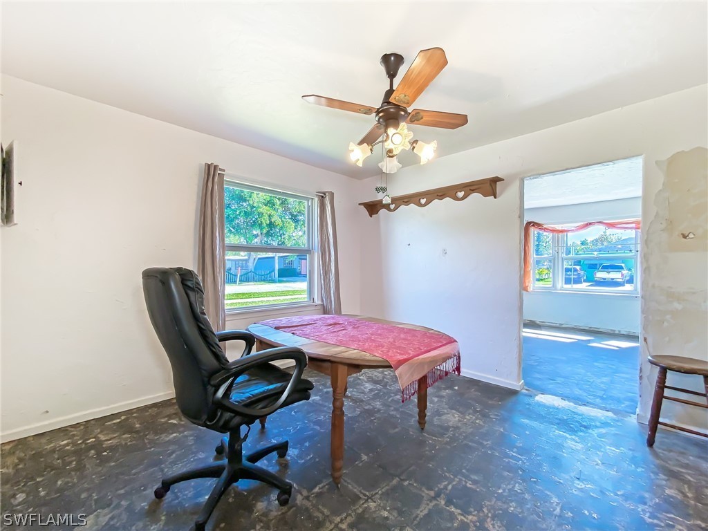 1573 Ransom Street Fort Myers, FL 33901 - Photo 8 of 29 a dining room with furniture and window
