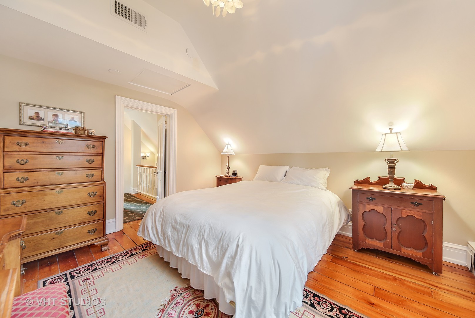 4604 Wolf Road Western Springs, IL 60558 - Photo 15 of 28 a bedroom with a bed and a lamp on dresser