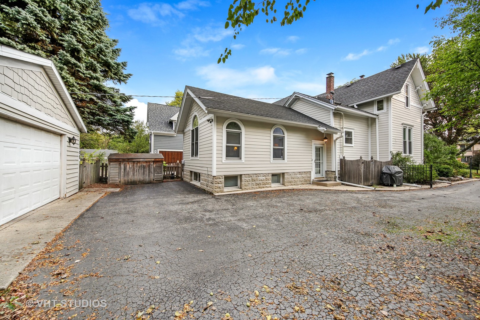 4604 Wolf Road Western Springs, IL 60558 - Photo 23 of 28 a view of a house with a backyard and road