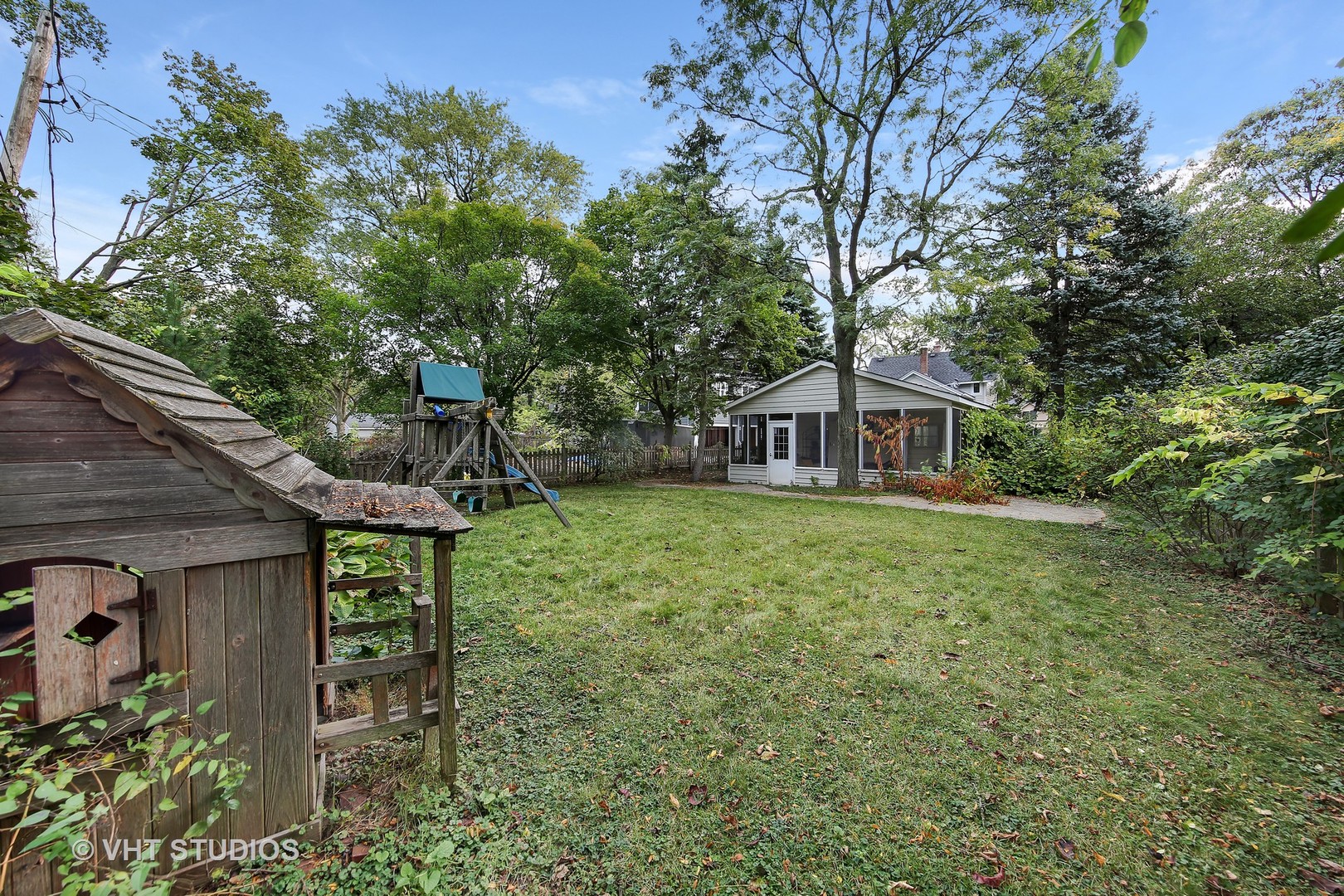 4604 Wolf Road Western Springs, IL 60558 - Photo 24 of 28 a front view of a house with garden