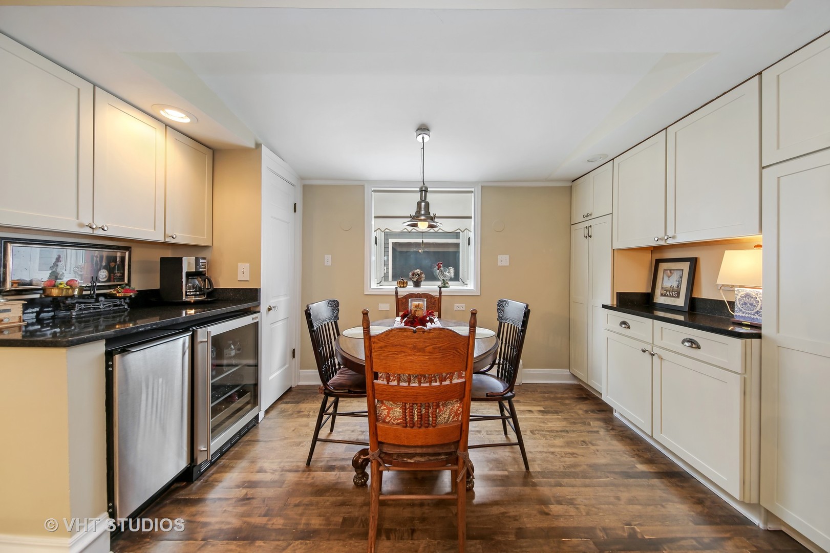 4604 Wolf Road Western Springs, IL 60558 - Photo 10 of 28 a kitchen with stainless steel appliances granite countertop a stove a sink a microwave and a refrigerator
