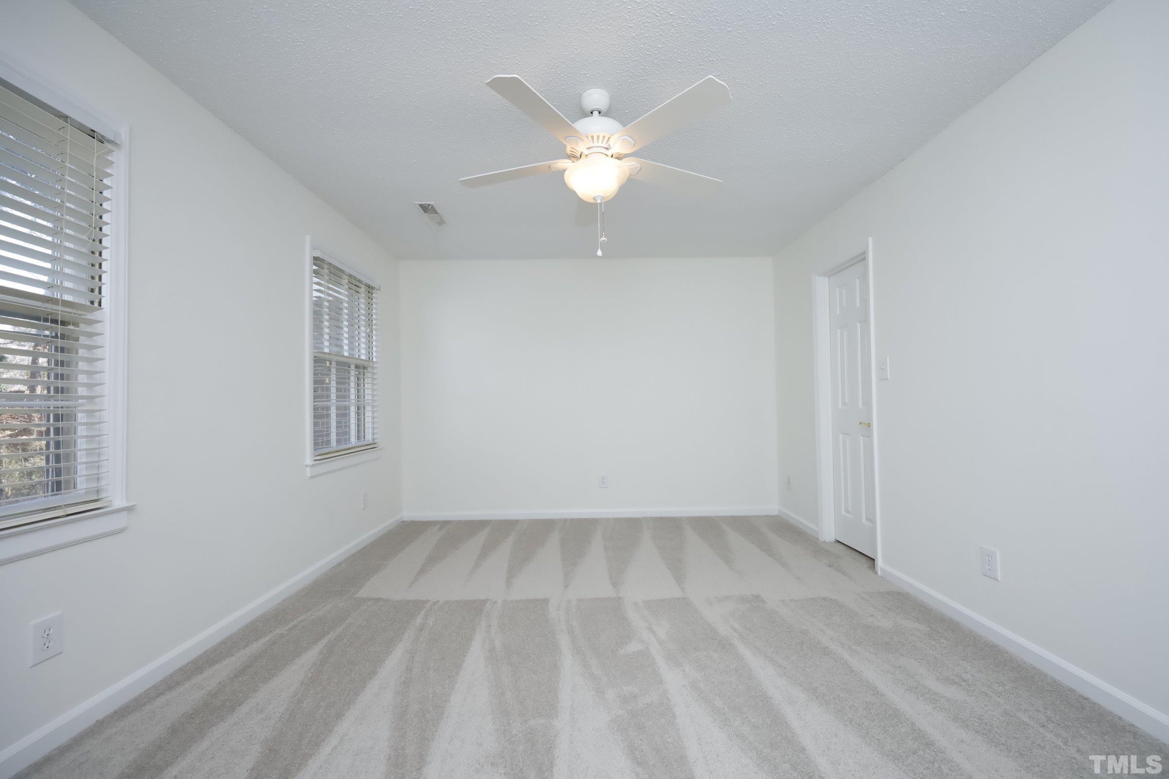 2838 Wycliff Road Raleigh, NC 27607 - Photo 17 of 39 wooden floor in an empty room with a window