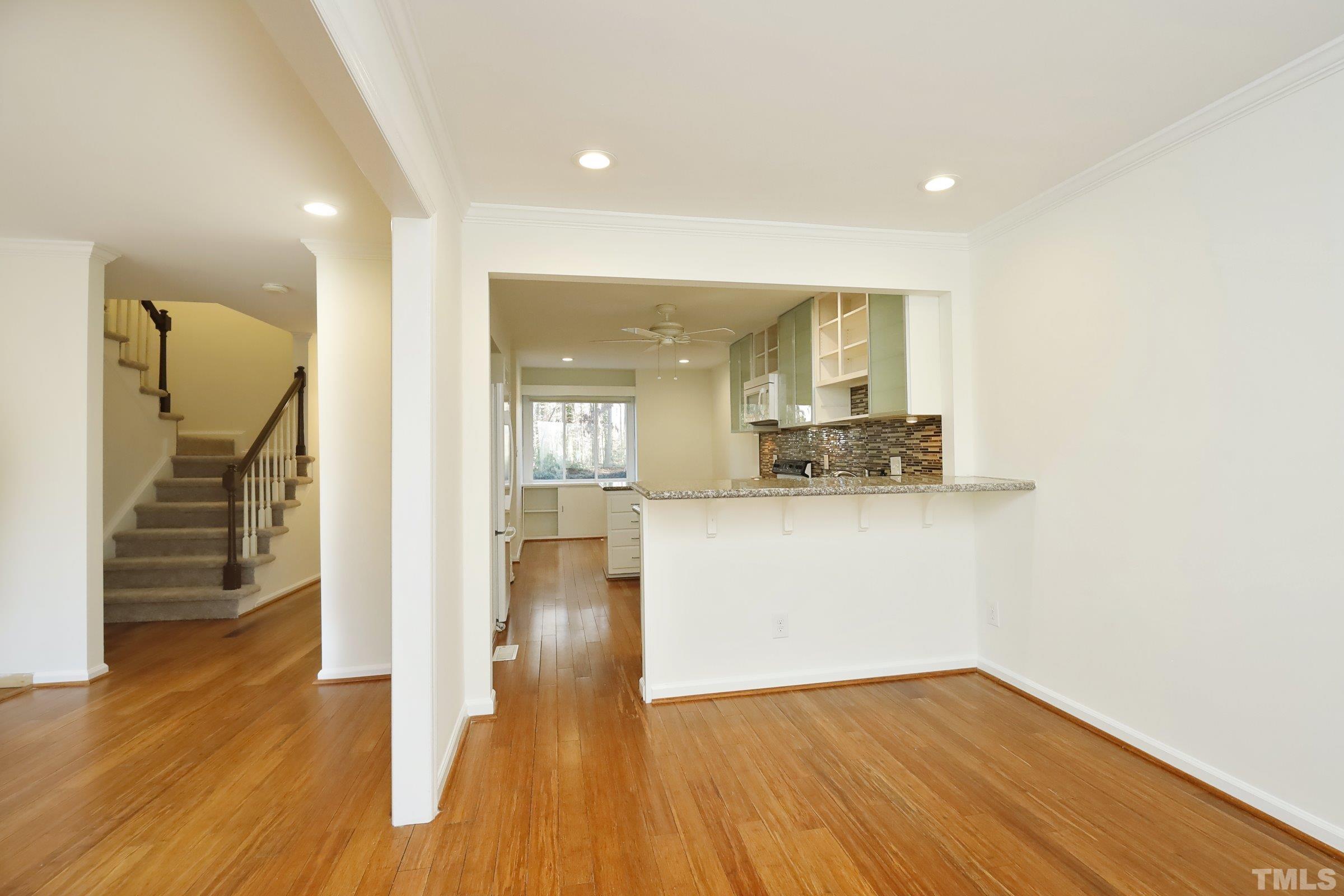 2838 Wycliff Road Raleigh, NC 27607 - Photo 6 of 39 a view of a kitchen cabinets and wooden floor