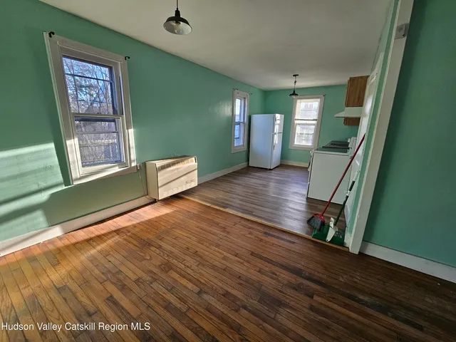 a view of an empty room and window