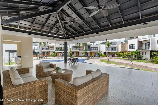 a view of swimming pool with chairs