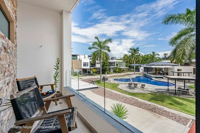 a view of a house with swimming pool