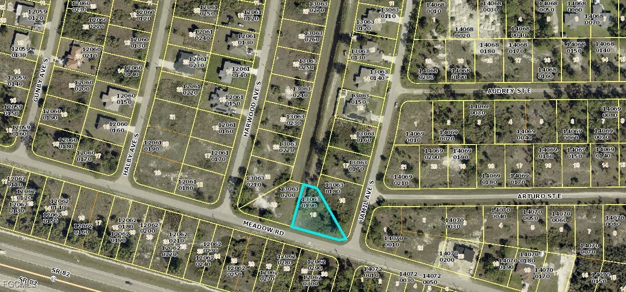 3057 Meadow Road Lehigh Acres, FL 33974 - Photo 2 of 2 a bathroom with a shower