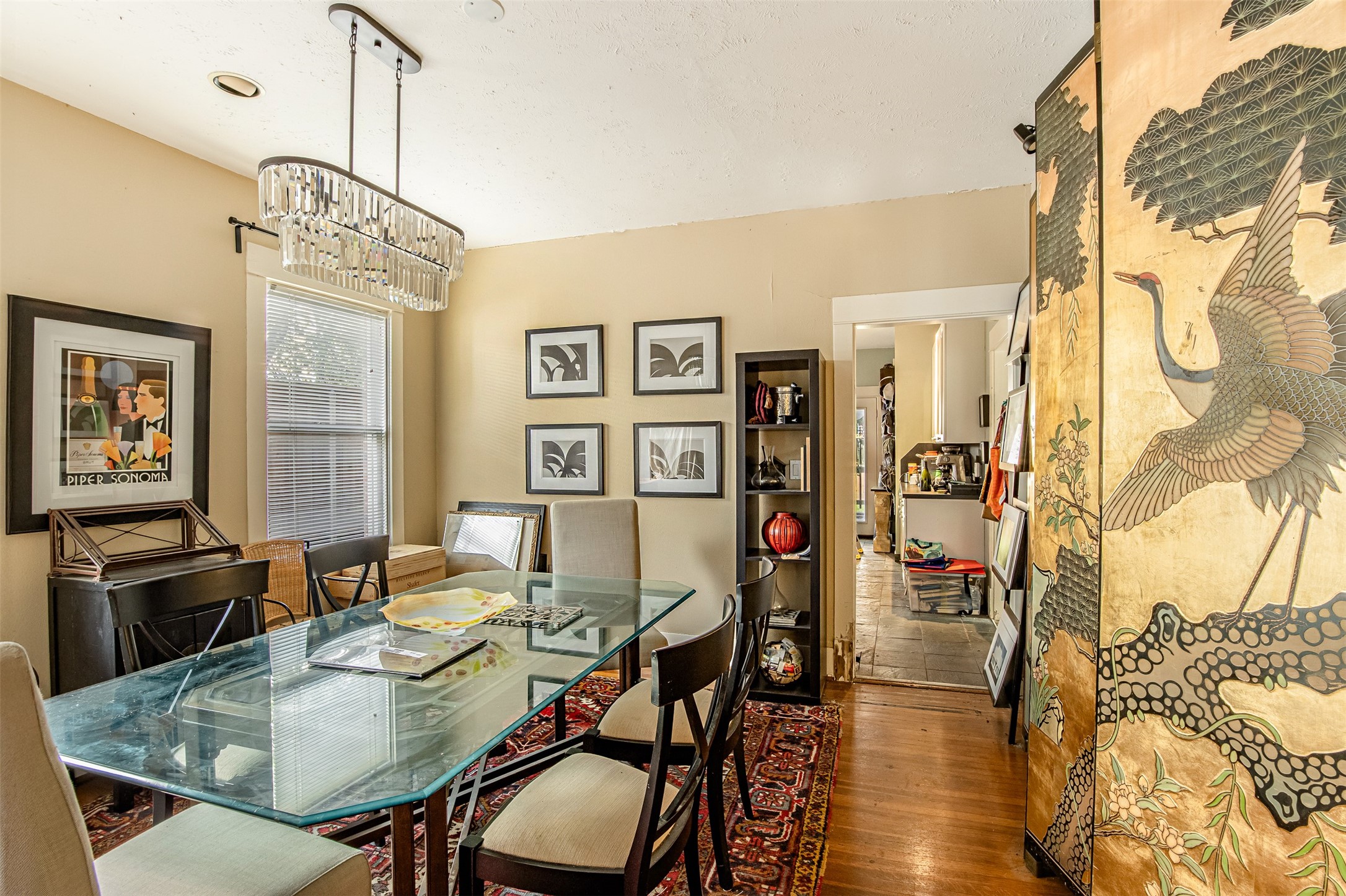 528 Hawthorne Street Houston, TX 77006 - Photo 10 of 34 a view of a dining room with furniture and wooden floor
