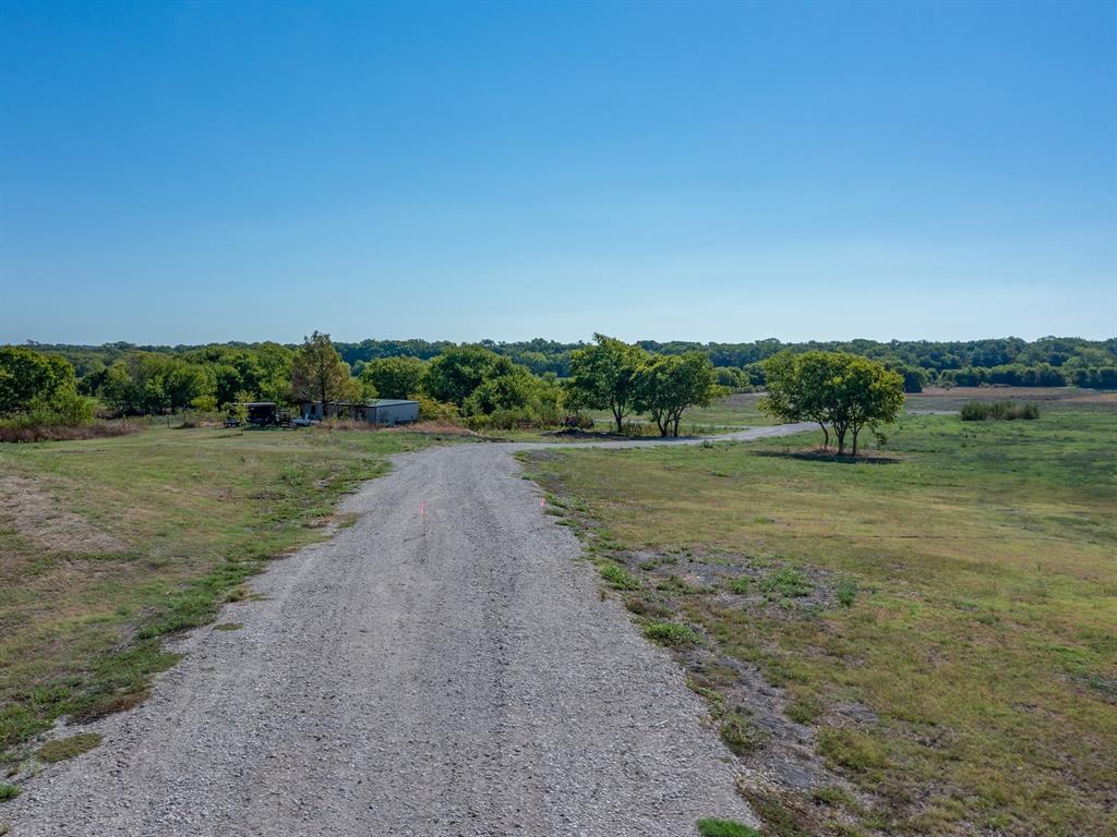 Lot 1 Lookout Circle Forney, TX 75126 - Photo 7 of 7 a view of a lake with a big yard