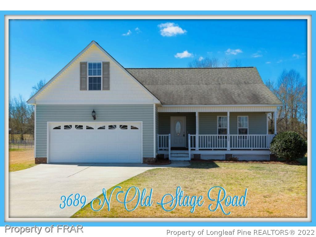 3689 Old Stage Road North Angier, NC 27501 - Photo 1 of 25 a view of a house with a yard