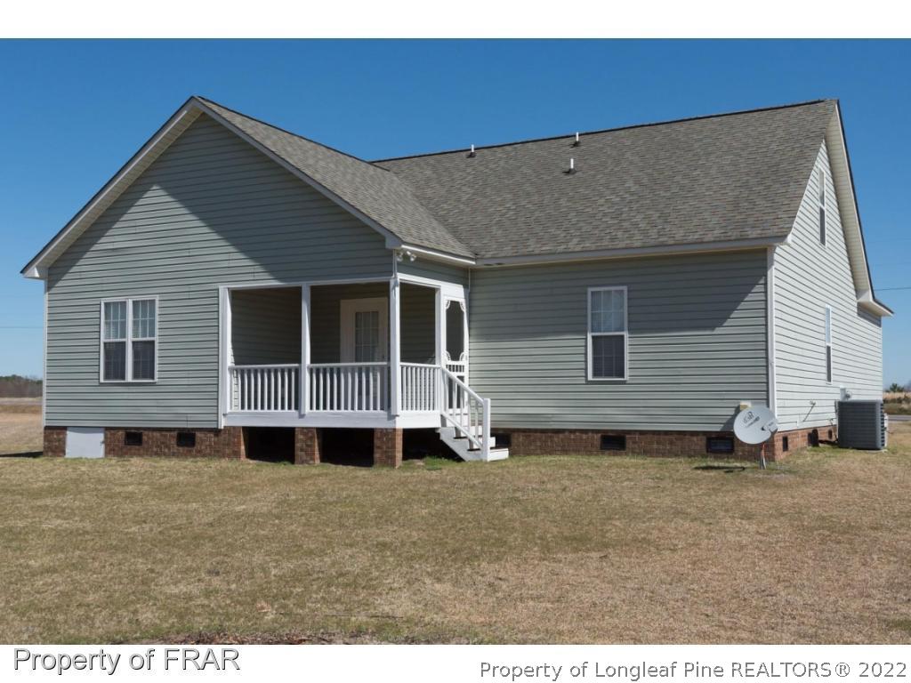 3689 Old Stage Road North Angier, NC 27501 - Photo 25 of 25 a house view with a backyard space