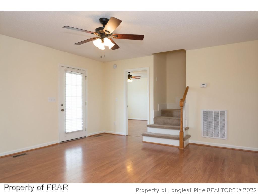 3689 Old Stage Road North Angier, NC 27501 - Photo 6 of 25 a view of entryway and hall with wooden floor