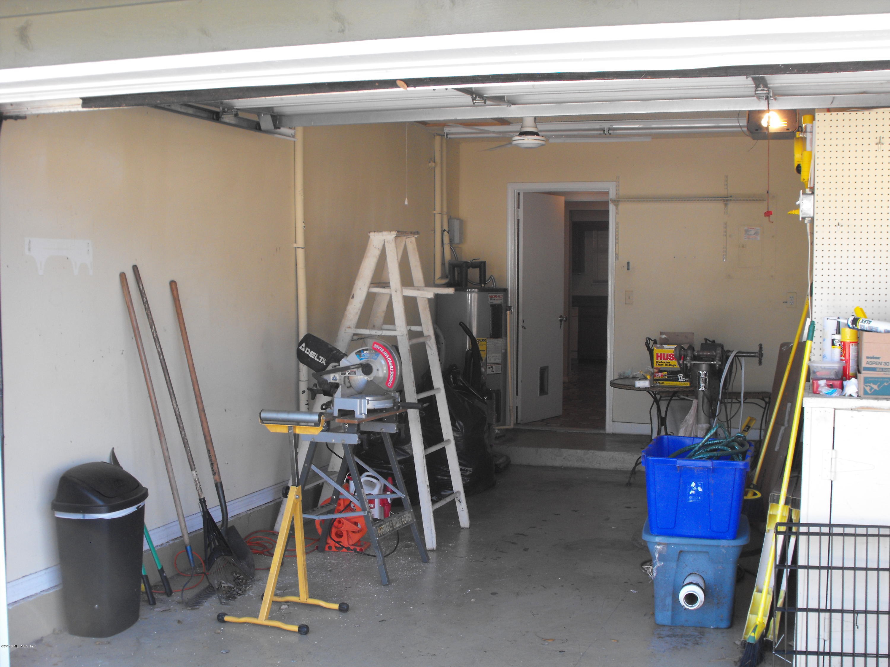 1543 Derringer Road Jacksonville, FL 32225 - Photo 10 of 19 a view of a room with gym equipment