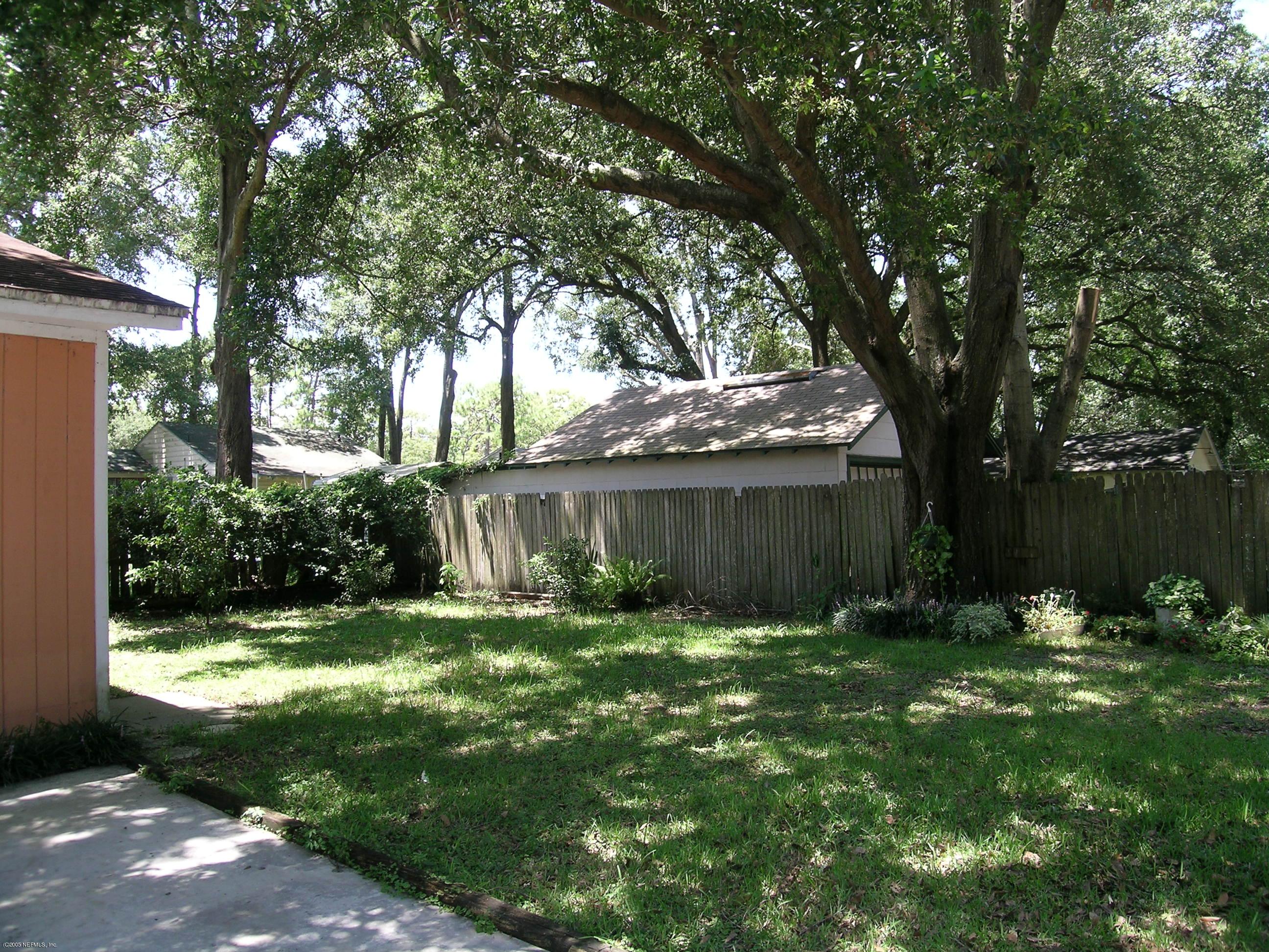 4622 Manchester Road Jacksonville, FL 32210 - Photo 3 of 9 a view of a back yard