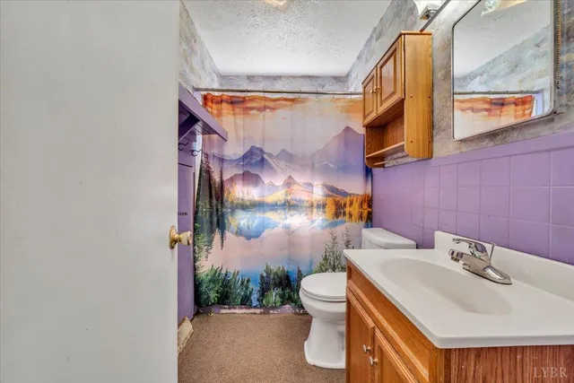 a view of a balcony with wooden floor