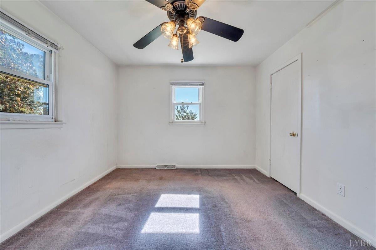 4152 Blue Ridge Drive Gretna, VA 24557 - Photo 28 of 74 a view of an empty room with a window