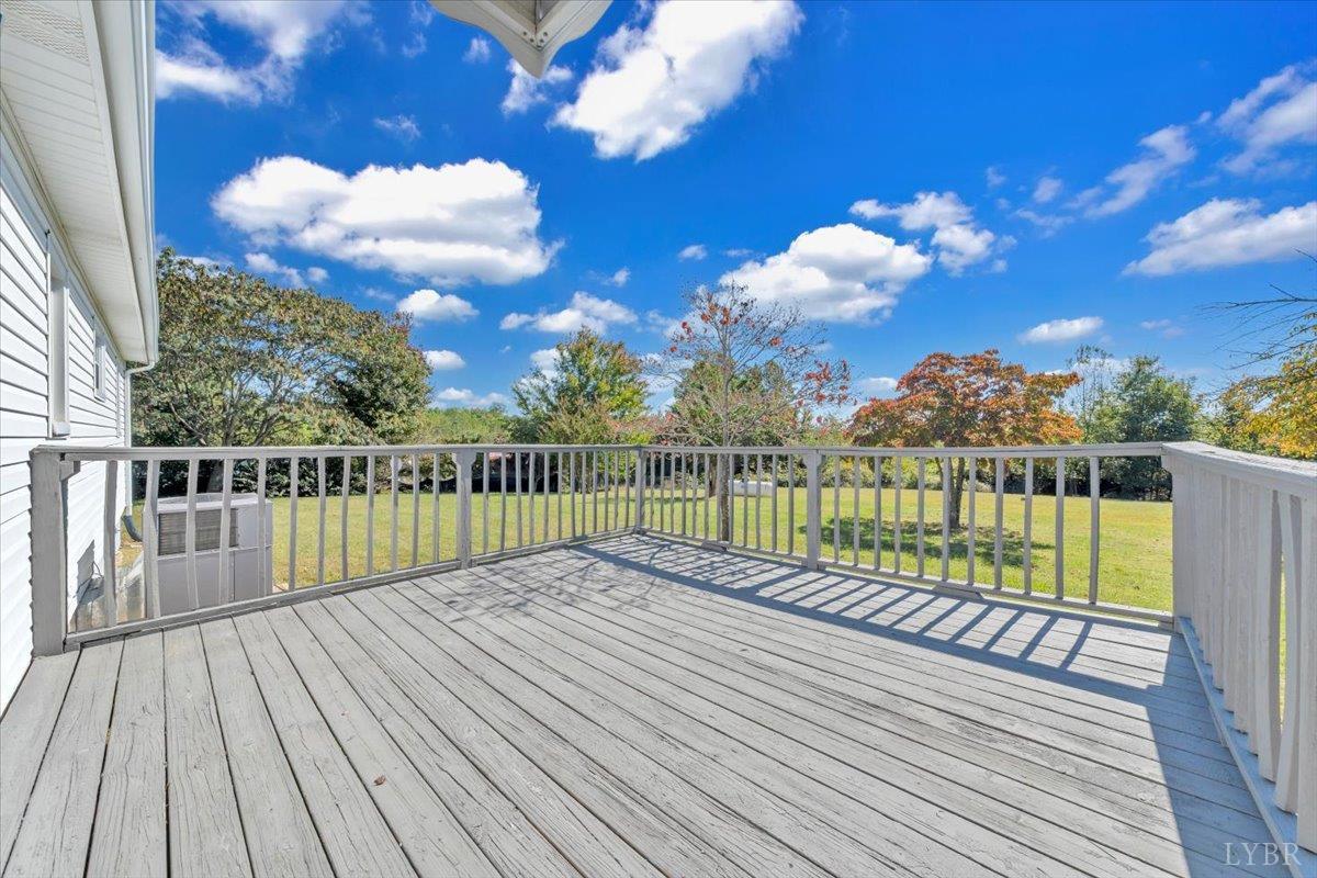 4152 Blue Ridge Drive Gretna, VA 24557 - Photo 29 of 74 a view of a balcony with wooden floor